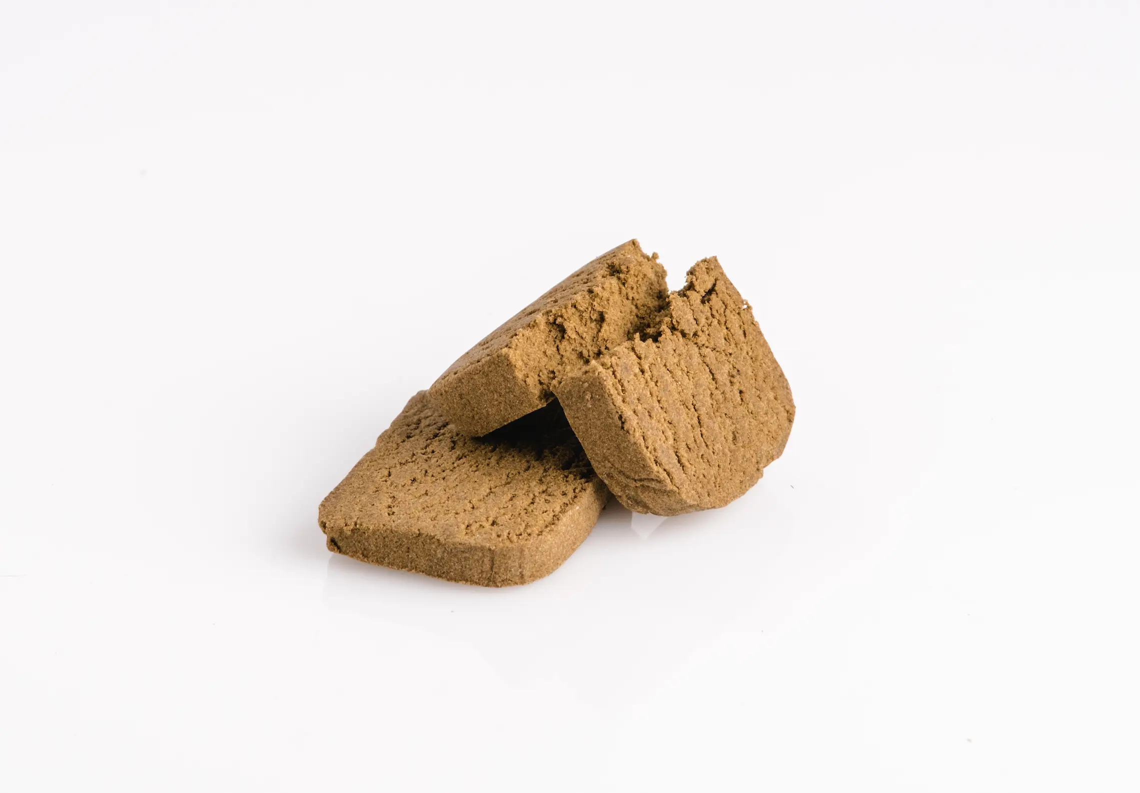 Two marijuana cannabis pollen hashish on a white b 2026 01 08 07 15 52 utc