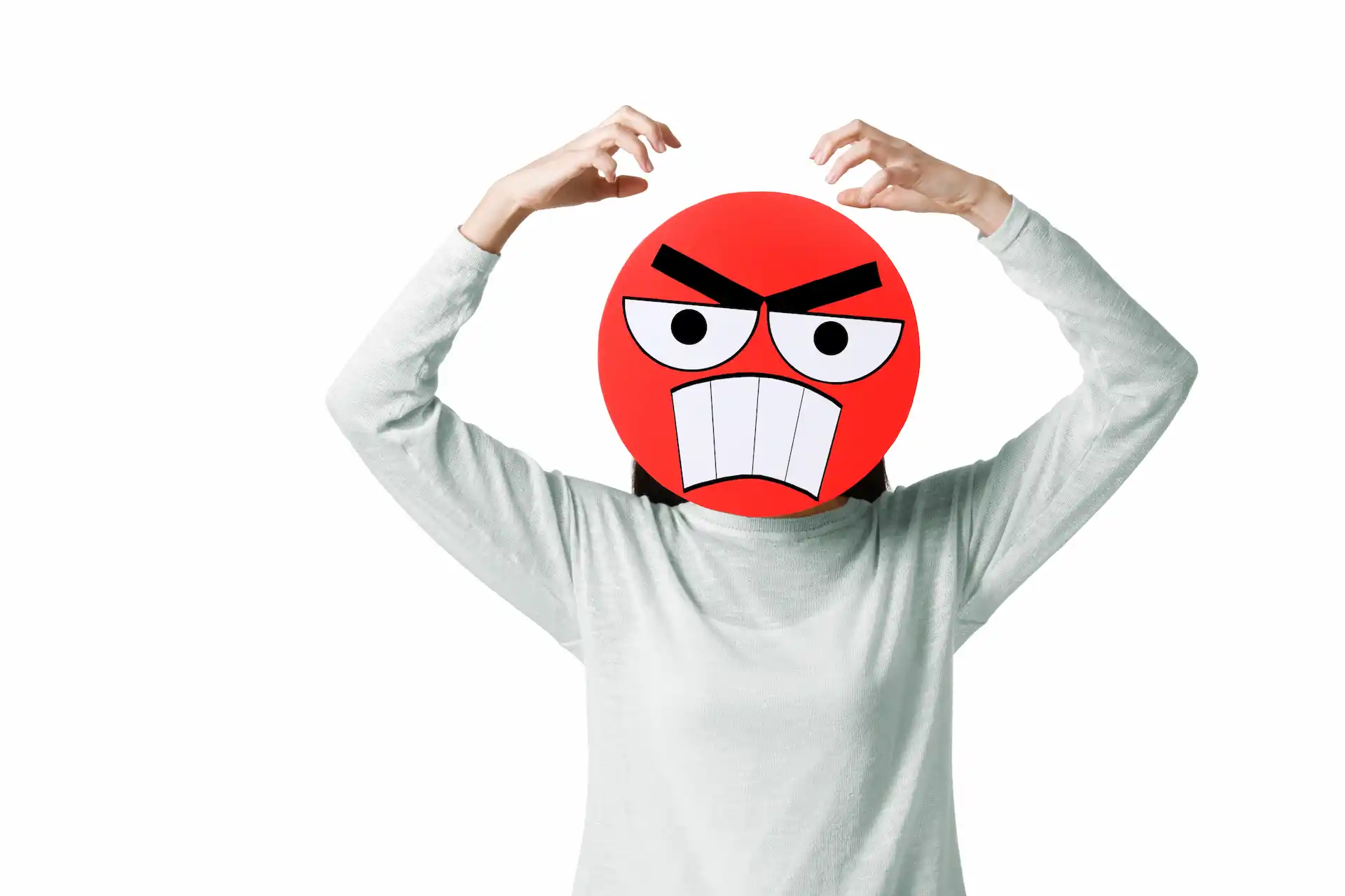 Young woman with a angry emoticon face in front of 2026 01 05 04 49 49 utc